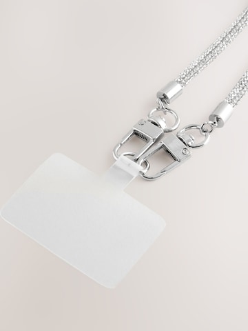 Next Handytrageriemen in Silber