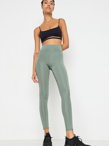 Trendyol Skinny Sports trousers in Green: front