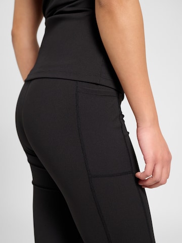 évasé Pantalon de sport Hummel en noir