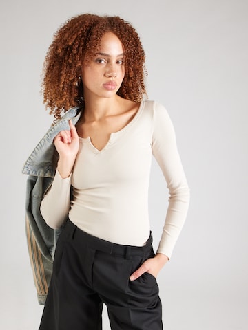 Tricou 'Cecile' de la STUDIO SELECT pe bej: față