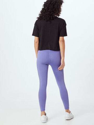 PUMA Skinny Sportovní kalhoty 'Evostripe' – fialová