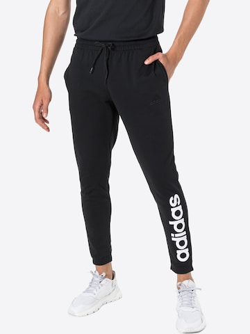 juoda ADIDAS SPORTSWEAR Siaurėjantis Sportinės kelnės 'Essentials Tapered Elastic Cuff Logo': priekis