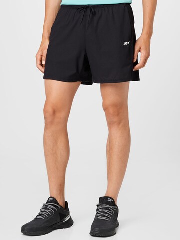 Reebok Regular Workout Pants in Black: front