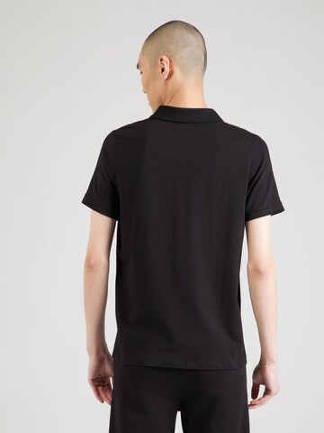 Tricou de la Karl Lagerfeld pe negru: spate