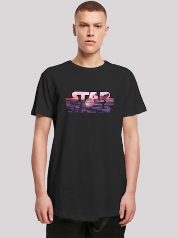 T-Shirt 'Star Wars The Mandalorian Child Ride The Sky' F4NT4STIC en noir : devant