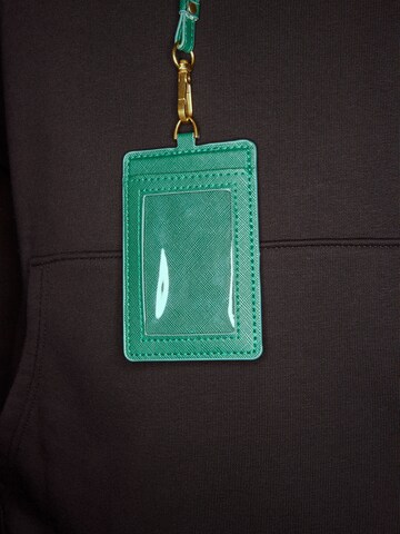 ABOUT YOU x Rewinside Wallet 'Claas' in Green
