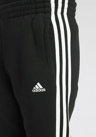 ADIDAS SPORTSWEAR Tapered Sports trousers 'Essentials' in Black