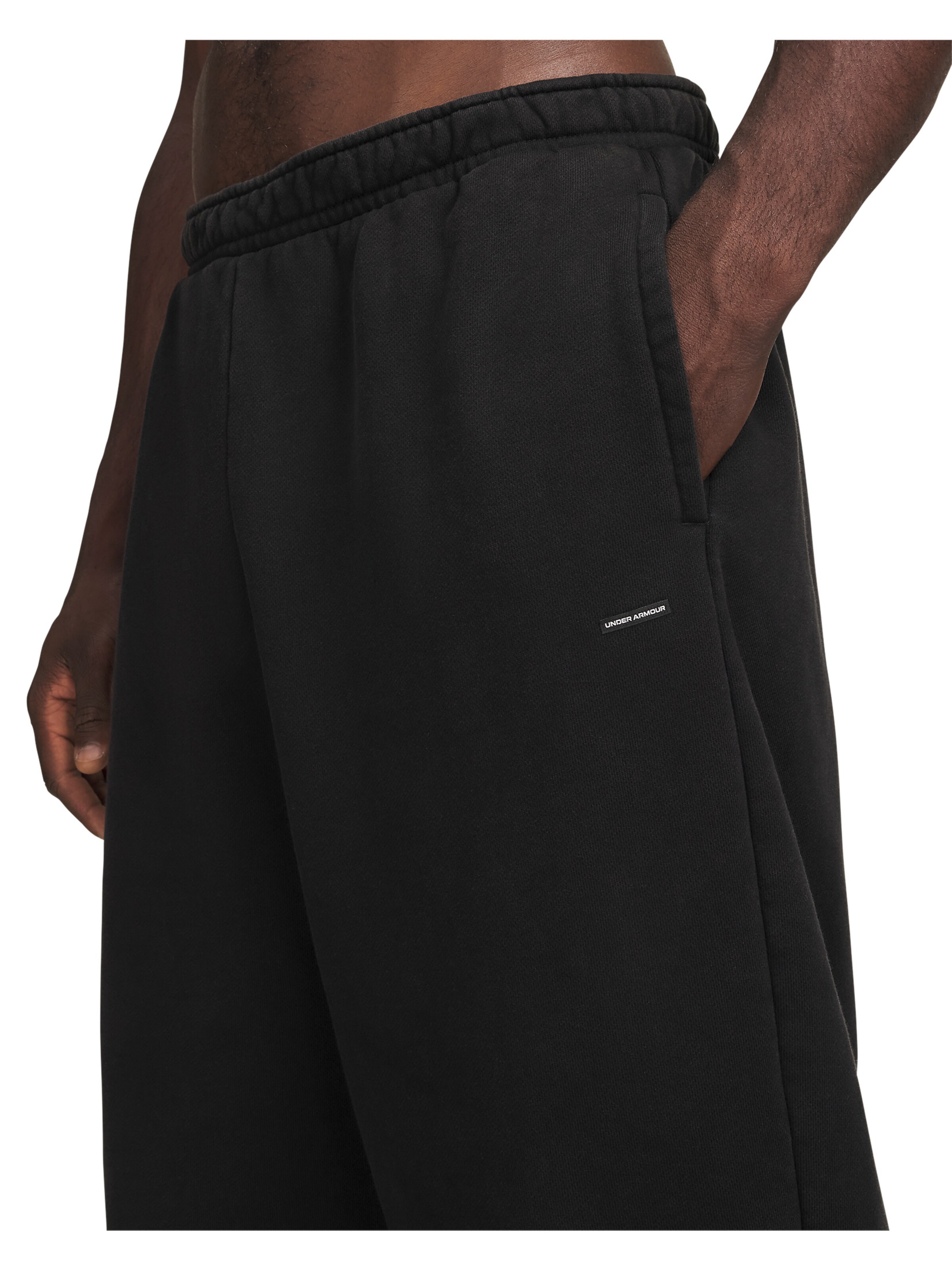 UNDER ARMOUR Regular Sports trousers in Black