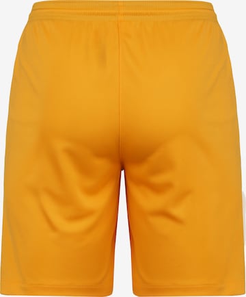 NIKE Regular Workout Pants in Orange