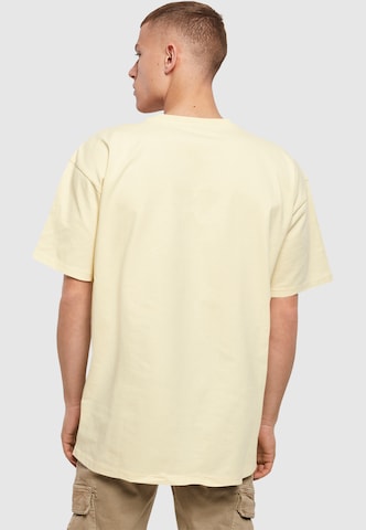 T-Shirt 'Abstract Waves' Merchcode en jaune