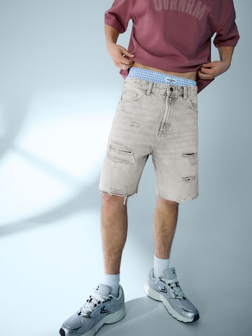 Bershka Baggy Дънки в сиво: отпред