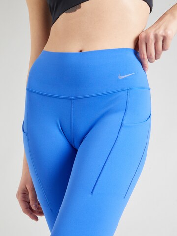 NIKE Skinny Urheiluhousut 'UNIVERSA' värissä sininen