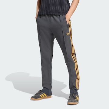 Effilé Pantalon 'Manchester United Terrace Icons' ADIDAS ORIGINALS en noir : devant