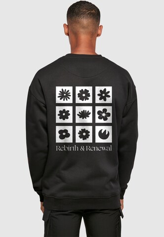 Merchcode Sweatshirt 'Rebirth And Renewal' in Black: front
