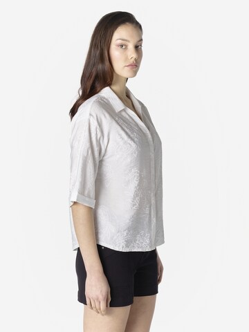KOROSHI - Blusa en blanco