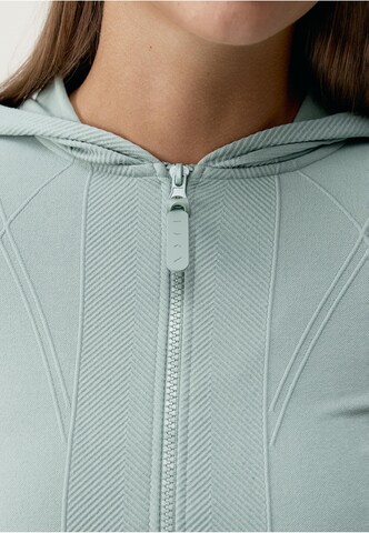 Veste mi-saison 'Sarvan' Born Living Yoga en vert