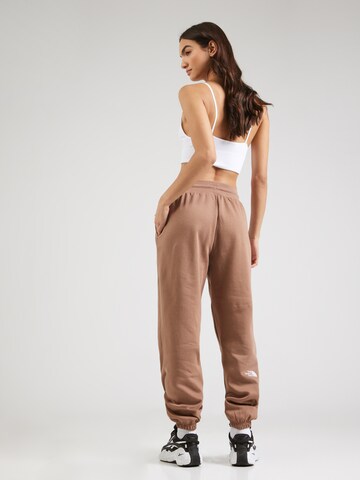 THE NORTH FACE - Tapered Pantalón 'ESSENTIAL' en marrón