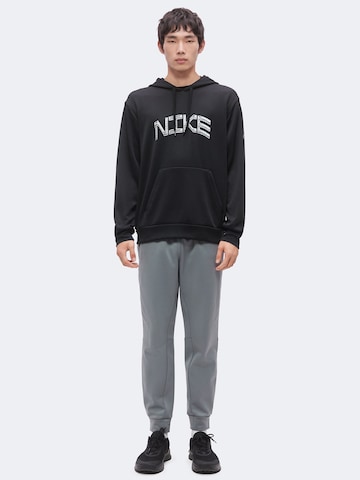 Sweat de sport 'FLEX' NIKE en noir