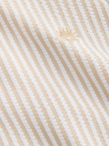 Next - Protección UV en beige