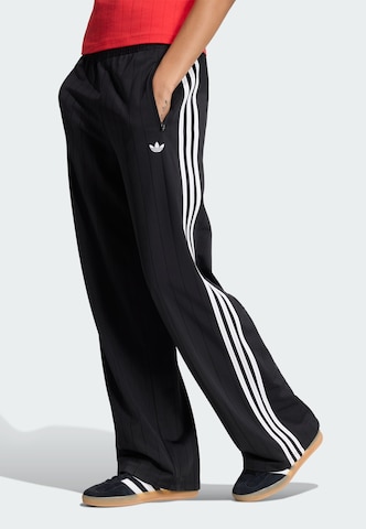 ADIDAS ORIGINALS - Loosefit Pantalón 'Firebird' en negro: frente