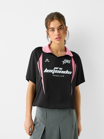 Bershka Poloshirt in Schwarz: predná strana