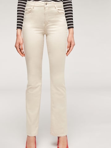 CALZEDONIA Flared Jeans in Beige: front