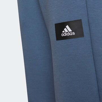 ADIDAS SPORTSWEAR Tapered Workout Pants 'Future Icons' in Blue