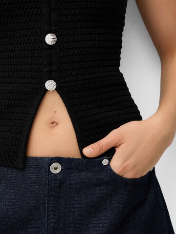 Top in maglia di Bershka in nero