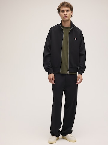 Veste de survêtement 'CAVALESE regular track jacket' FILA en noir
