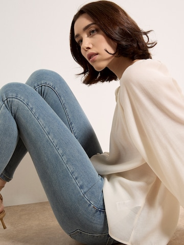 Skinny Jean Apricot en vert