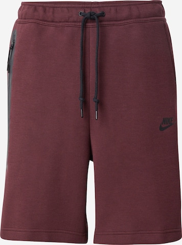 Nike Sportswear - Pantalón 'TCH FLC' en rojo: frente