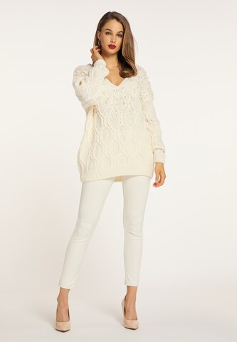 Pullover di faina in bianco