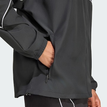 ADIDAS PERFORMANCE Sportdzseki 'Adizero Archive' - fekete
