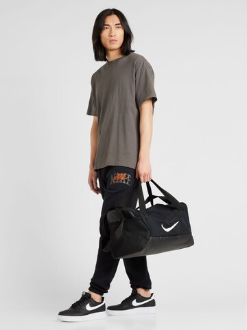 Nike Sportswear Tapered Παντελόνι 'CLUB BB CF' σε μαύρο