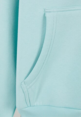 Giacca di felpa 'Essential' di Karl Kani in blu