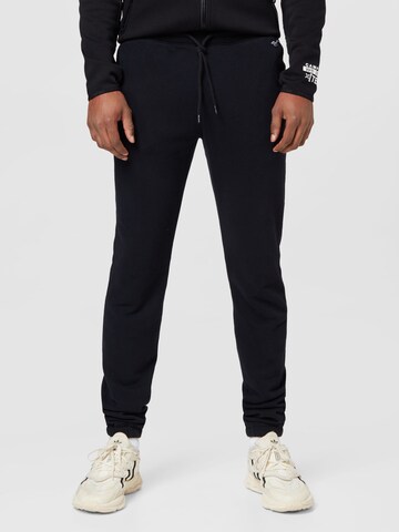 HOLLISTER Tapered Pants in Black: front