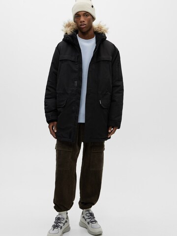 Pull&Bear Winter coat in Black: front