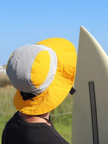 Cappello sportivo di Surf Monkey in giallo
