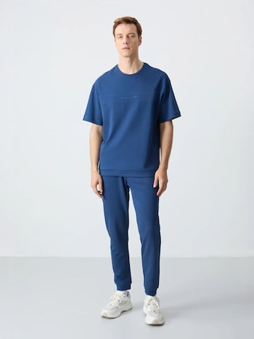 Survêtement Tommy Life en bleu : devant
