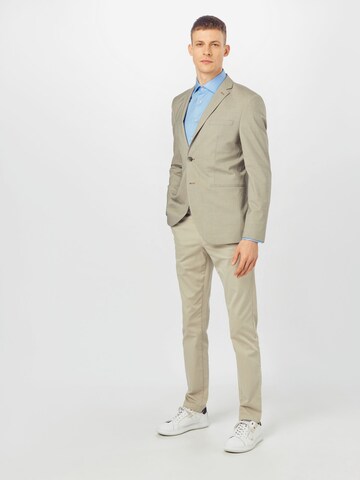 TOMMY HILFIGER - Slimfit Pantalón chino 'DENTON TH FLEX SATIN CHINO GMD' en beige