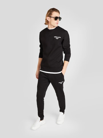 BJÖRN BORG Sport sweatshirt 'ESSENTIAL' i svart
