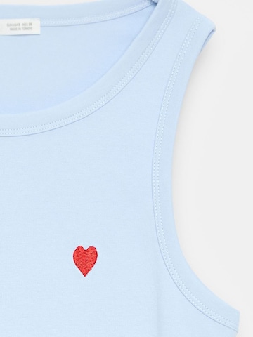 Top di Dilvin in blu