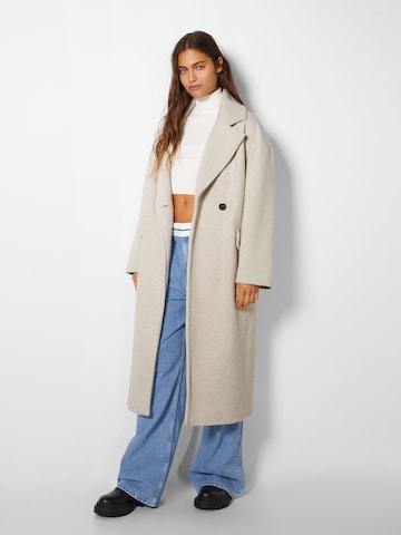 Bershka Between-Seasons Coat in Beige: front