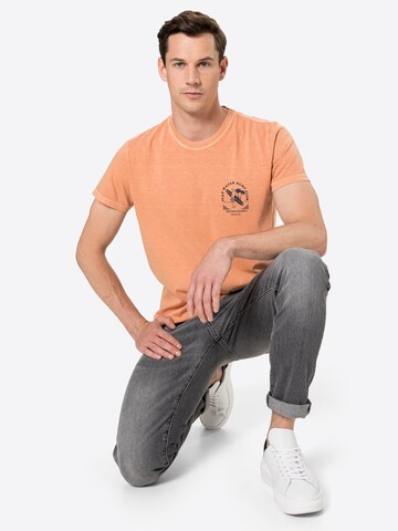 Revolution T-shirt i orange