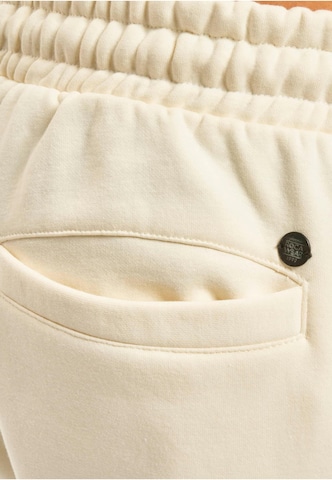 ROCAWEAR Конический (Tapered) Штаны в Бежевый