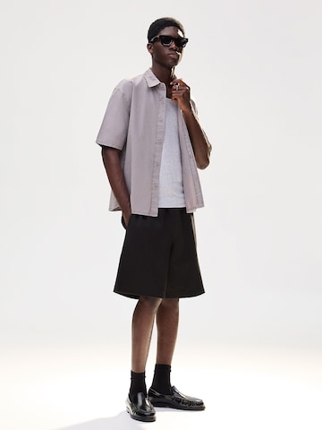 Bershka Bő szár Nadrág - fekete: elől