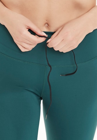 ENDURANCE - Skinny Pantalón deportivo 'Franza' en verde