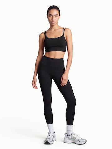 V!BE STUD!OS Bustier Urheilurintaliivit värissä musta
