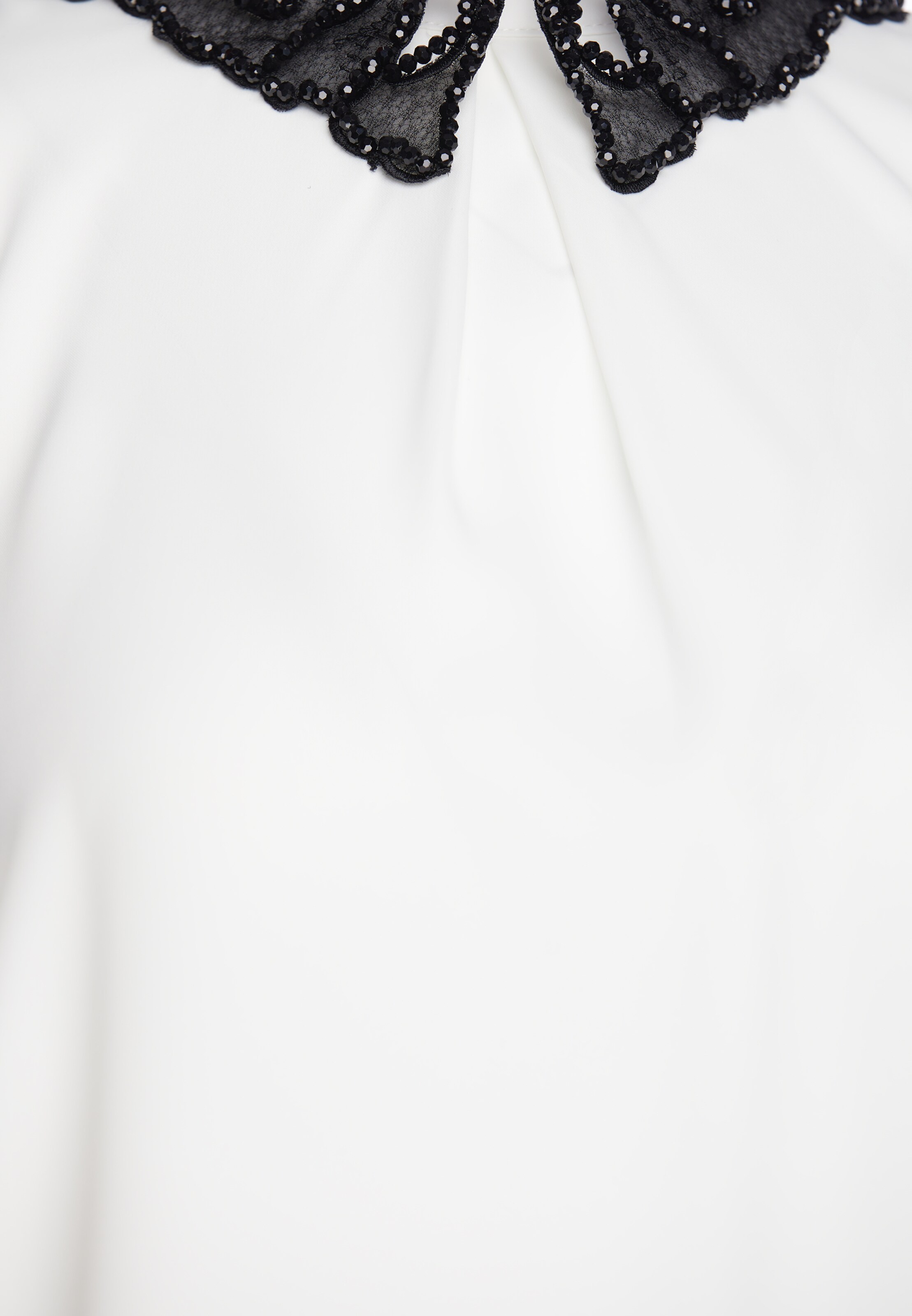 faina - Blusa 'GLOW' en blanco