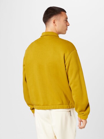 Nike Sportswear - Casaco em moletão 'HARRINGTON' em amarelo